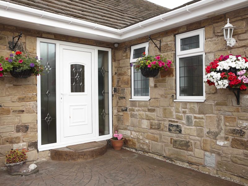How can you ensure longevity and performance with the right window and door materials?